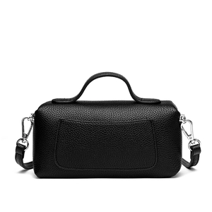Minimalist black lychee pattern leather box bag with silver hardware and shoulder strap