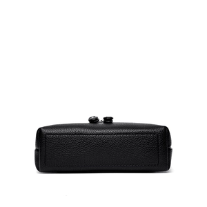 Minimalist black pebble leather crossbody box bag with premium stitching and bottom detail