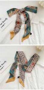 Close-up of narrow silk twilly with Chinese landscape art and calligraphy painting