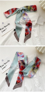 Floral print narrow silk scarf styled as an elegant necktie on a white shirt collar