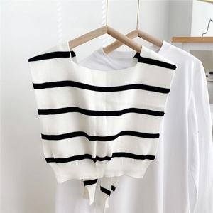 Minimalist black and white striped knit shawl vest with front tie and square neck detail