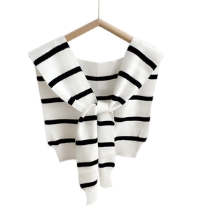 Classic black and white striped knit shawl wrap with a front-tie design for women