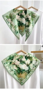 Detail showing an oil painting rose print faux collar scarf with green floral pattern