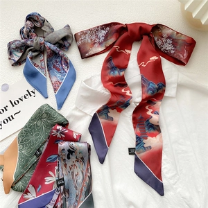 Multiple 100% silk skinny scarves with oil painting patterns on white shirt background