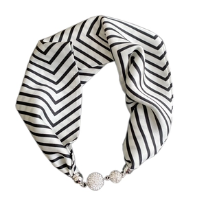 Elegant silk neck scarf with black white stripes and rhinestone magnetic ball closure