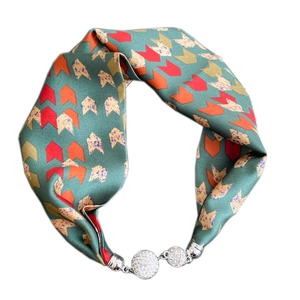 Green silk scarf necklace with geometric arrow prints and magnetic rhinestone ball clasps