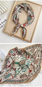 Macro detail of vintage horse carriage print on pleated plissé neck scarf texture