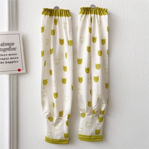 Detail of ice silk sun protection sleeves with cute cartoon cat pattern and elastic cuff