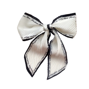 Pleated long silk scarf for women featuring white fabric with black text printed edges