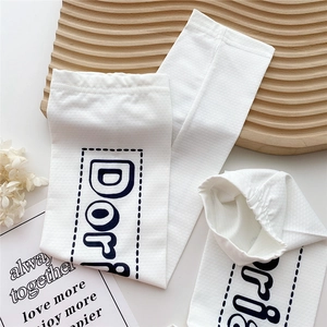 White breathable ice silk sun protection sleeves with Doris print on wooden board