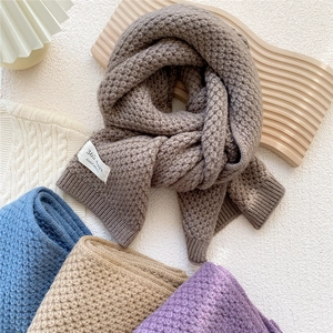 Minimalist chunky knit scarf set in autumn colors with handmade decorative label detail