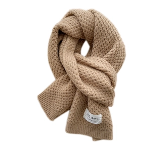 Chunky knit camel scarf for women in a thick honeycomb pattern with handmade label