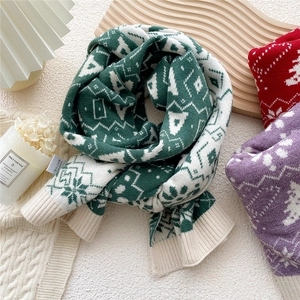 Winter knitted scarf with Nordic snowflake patterns in dark green, red, and light purple