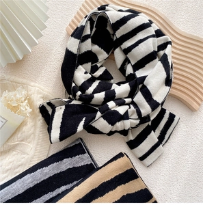 Three-color striped knitted scarves display with thick winter texture and modern pattern