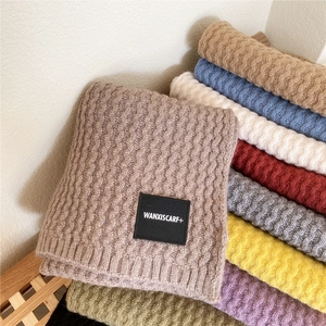 Thick knitted wave pattern winter scarf for women in multiple colors with woven label