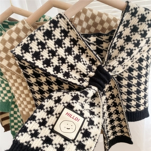 Knitted checkered shawl wrap for women featuring classic houndstooth and smile face patch