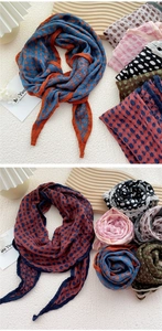 Close-up of double-sided polka dot and plaid jacquard cotton linen scarf with fringe