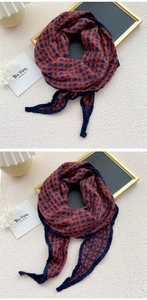 Detail of double-sided cotton linen scarf featuring vintage polka dot and check patterns