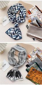 Detail of silk-feel long necktie scarves with geometric patterns and floral prints