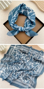 Detail of navy blue cotton linen square scarf with white abstract branch patterns