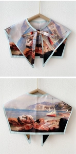Detail of artistic coastal oil painting print on silk scarf shawl with long bow ties