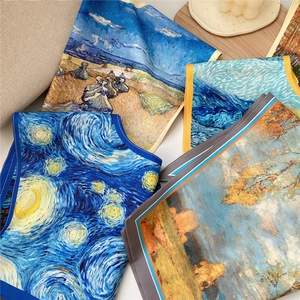 Van Gogh oil painting art print silk scarves displayed on a rustic wooden table setup