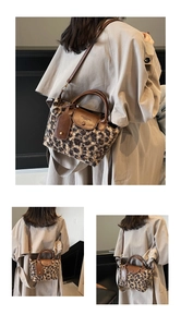 Close-up of leopard print faux fur shoulder bag with premium brown leather strap and magnetic flap