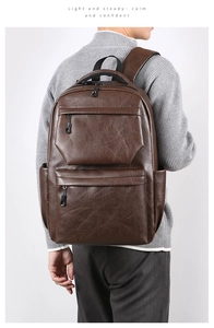 Detail of dark brown retro PU leather backpack with ergonomic wide shoulder straps
