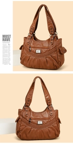 Detailed view of dark brown soft leather bag with woven texture and multiple pockets