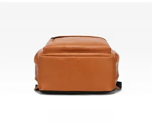 Close-up of the wear-resistant brown PU leather bottom with textured litchi grain detail