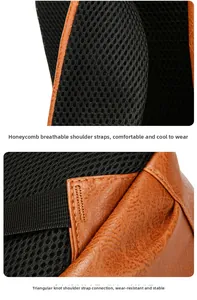 Detail of reinforced triangular stitching and breathable honeycomb mesh shoulder straps on backpack