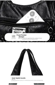 Detail of soft washed leather bag with front zipper pocket and reinforced wide handle