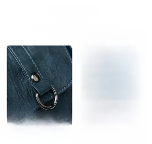 Detail of blue lychee grain leather with premium metal rivets and zipper hardware