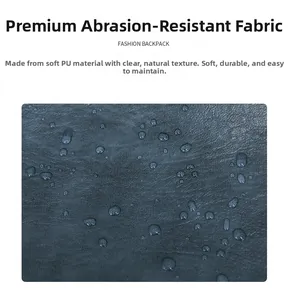 Detailed macro view of soft, waterproof blue PU leather texture for fashion backpacks