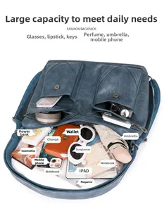 Macro view of navy blue faux leather tote showing spacious interior for daily essentials