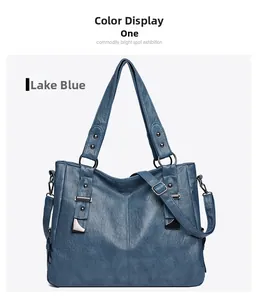Detailed view of the lake blue lychee texture tote bag with silver metal buckles