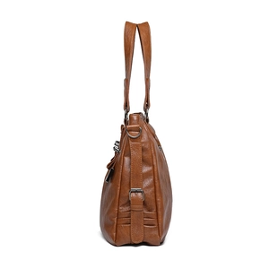 Brown soft leather tote bag for women featuring a vintage texture and side buckle detail