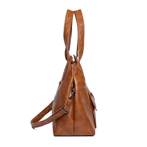 Brown faux leather tote bag with large capacity and adjustable crossbody strap