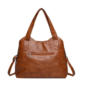 Minimalist large brown PU leather tote bag with front zipper and adjustable shoulder strap