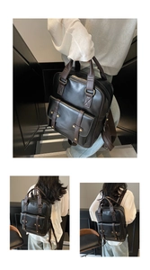 Detail of vintage black leather backpack with brown handles and dual strap pockets