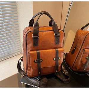 Close-up of vintage brown backpack showing buckle details and premium PU leather texture