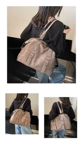 Detail of taupe PU leather tote bag showing wide straps and versatile carrying styles