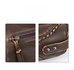 Detail view of high quality fabric with metallic zipper and studded woven leather trim