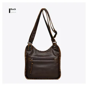 Rear view of vintage dark brown leather crossbody bag with back zipper pocket