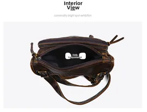 Internal view of vintage brown leather crossbody bag with spacious main zip compartment