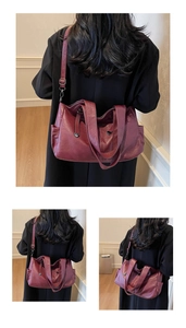 Detail view of burgundy tote bag with adjustable strap and smooth leather texture