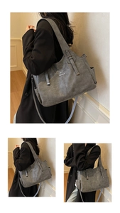 Three-way view of a grey tote bag showing wide top handles and side pocket details