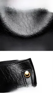 Detailed macro shot of the black textured leather and gold cylindrical rivet hardware