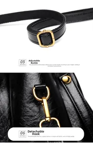 Close-up of golden adjustable buckle and detachable metal hook on black leather handbag