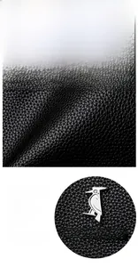 Vue détaillée de la texture du cuir brillant et du logo métallique en forme d'oiseau